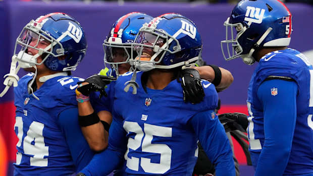 Nov 26, 2023; East Rutherford, New Jersey, USA; New York Giants cornerback Deonte Banks (25) celebrates an interception against New England Patriots in the 1st half at MetLife Stadium.